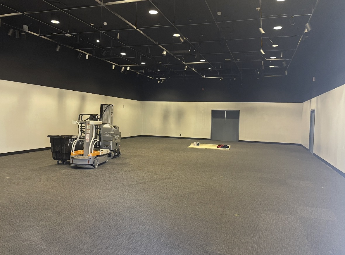 Commercial space with finished dark ceiling and walls